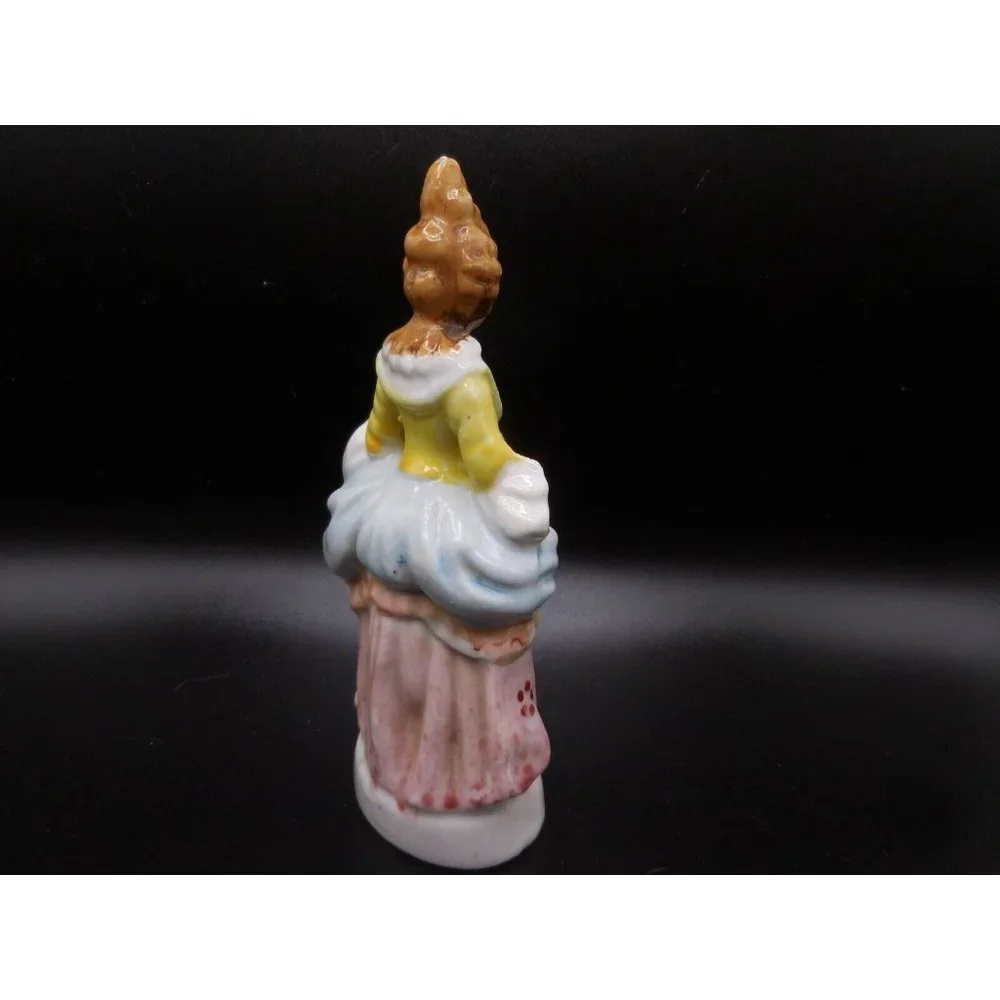 Vintage Occupied Japan Colonial Woman Figurine Pink Skirt Yellow Top 5 1/4